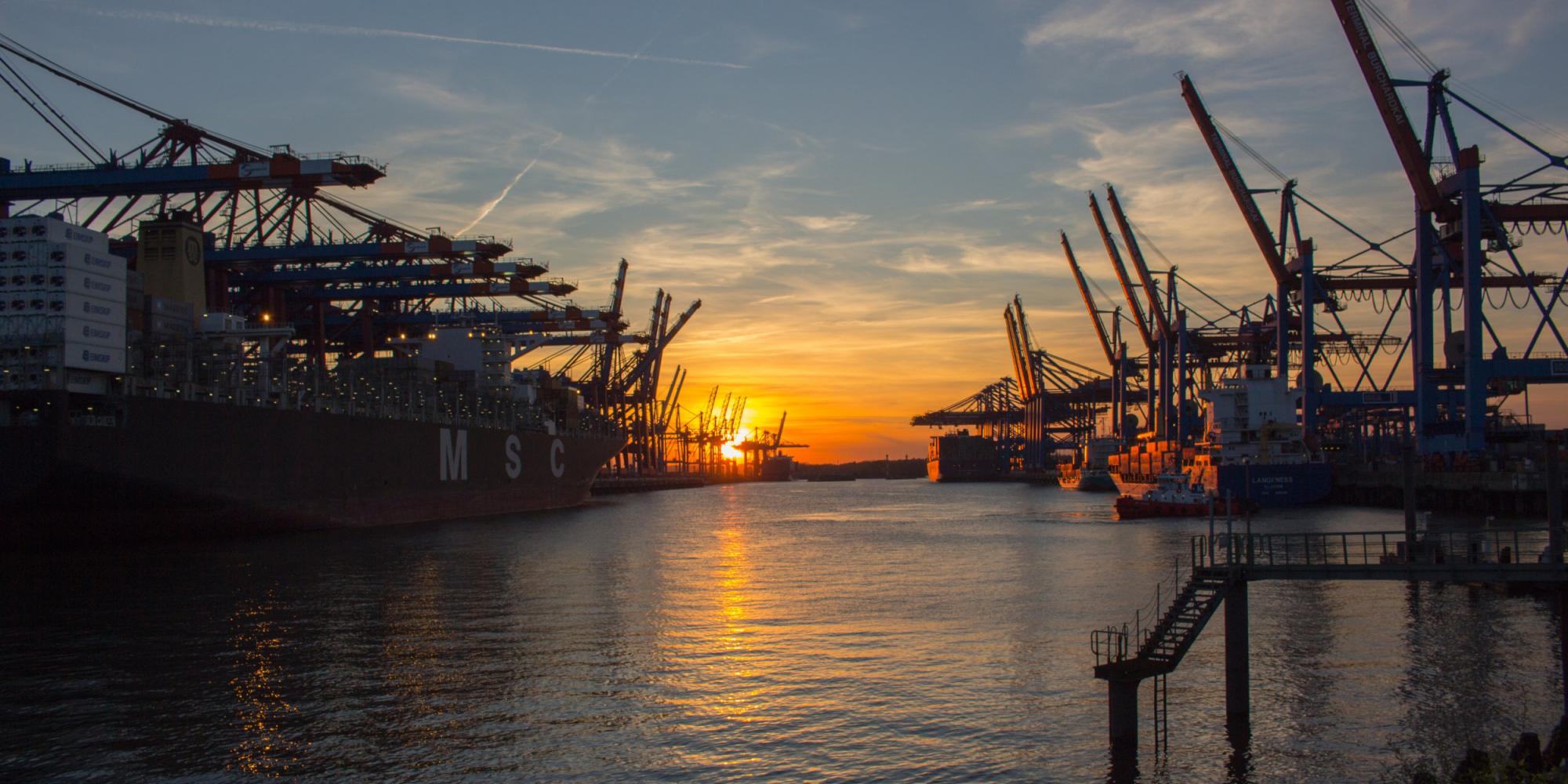 two ships docked at the port of Hamburg